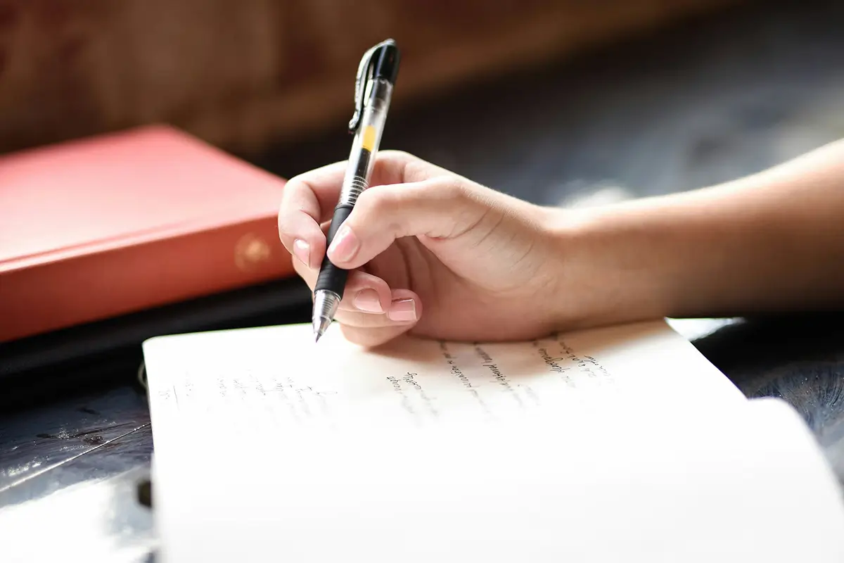 What Are Tax-Deductible Donations? - Donationpickup Writing notes about donation